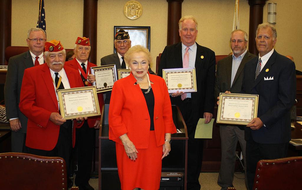 Carl N. Steinberg, James W. Donechie, Jr., the Borough of Freehold, the Marine Corps League Corporal Philip A. Reynolds Detachment and the Veterans of Foreign Wars, Freehold Post No.4374 are recognized for the restoration of the Freehold World War II Honor Roll and Court of Honor. Pictured left to right: Commissioner Glenn Cashion, John Bosco, Tim Rohan, James W Donechie Jr., Freeholder Lillian G. Burry, Mayor J. Nolan Higgins, Kevin Coyne and Carl N. Steinberg. 